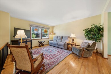 Step into the bright living room with a newer picture window