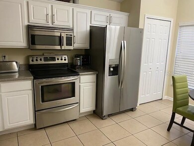 Remodeled kitchen with stainless steel appliances.
