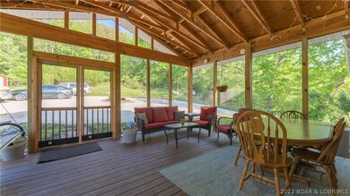  Sheltered screened in front porch