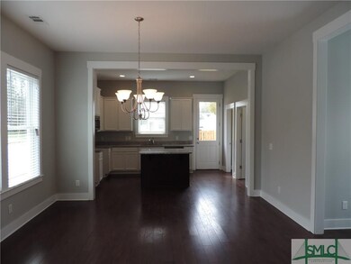 View of Dining Area and Kitchen