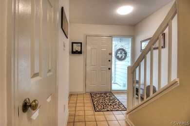 Greet your guests in the tiled foyer.
