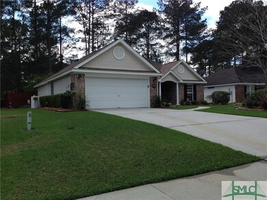 Beautifully manicured and landscaped front and sid