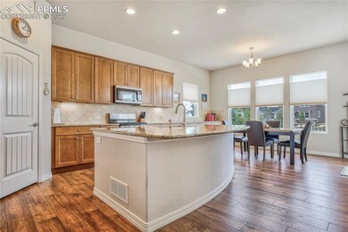 The gourmet kitchen is the hub of the home featuri