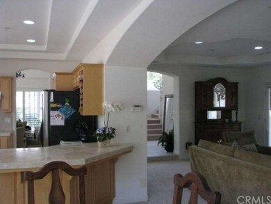 Kitchen into Dining Room and Living Room