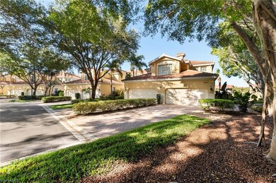 Mediterranean / spanish-style house featuring a tile roof, stucco siding, and driveway
