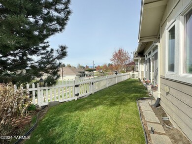 Backyard with White Picket Fence