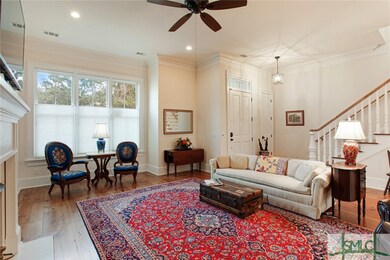The living room highlights extra wide crown mouldi