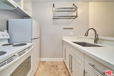 Garden Villas unit 120, Los Angeles, CA 90020 - photo 2