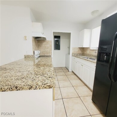 2433 Lola Ave S, Lehigh Acres, FL 33973 - photo 5