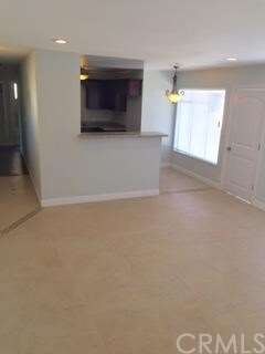LIVING ROOM WITH NEW PAINT, CUSTOM CERAMIC TILE FL