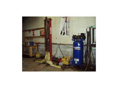 Car lift and air compressor. Air compressor is not
