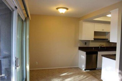 The dining area is next to the kitchen and right b