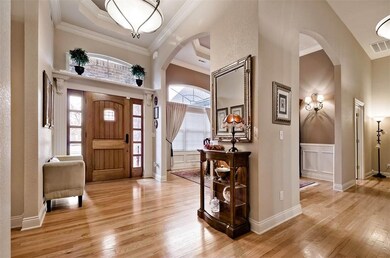 Spacious and Open Foyer with High, Tiered-Ceilings