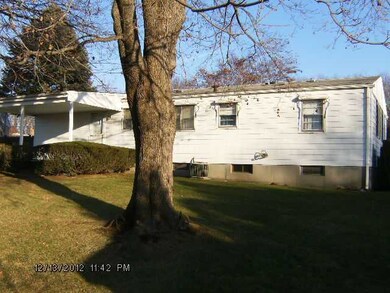 Exterior Back. Covered patio,big yard.