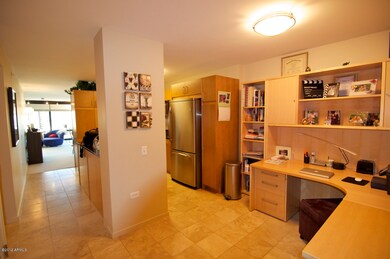 office leading into kitchen
