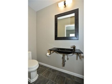 Partial Bath. Sleek and contemporary fixtures take