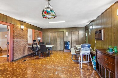 Large flexible room/space off of living room. perfect for extra dining area, game room, office space etc.