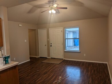 Foyer with dark hardwood / wood-style flooring, lo