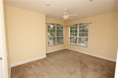Second bedroom with window views from two sides.