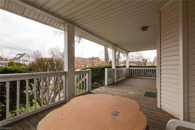 Front porch welcomes you with old-fashioned charm!