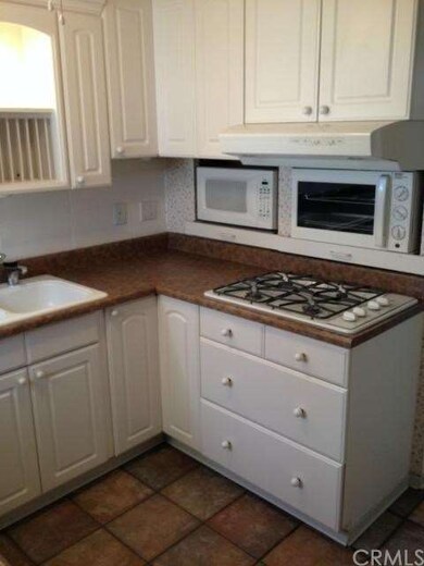 Updated Kitchen with White Cabinets, Gas Range, Ca