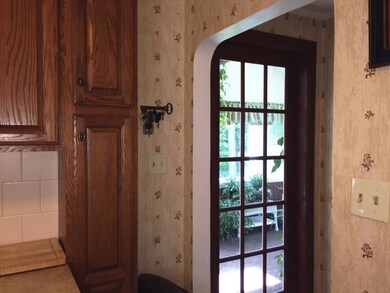 A nifty pocket door with glass...