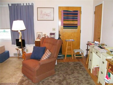 The other side of the living showing the front doo