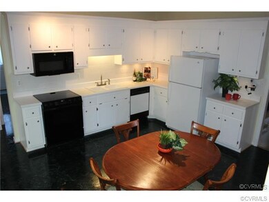 Eat-in-kitchen has great track lighting and under 