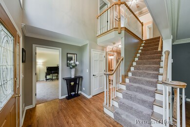 Beautiful 2 story foyer welcomes your guests.