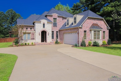 French country style house featuring driveway, an 