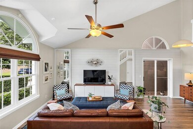 High Ceilings and updated flooring give this wonderful home a very updated look