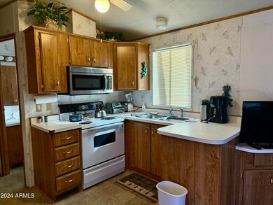 7750 E. Broadway Rd. #149