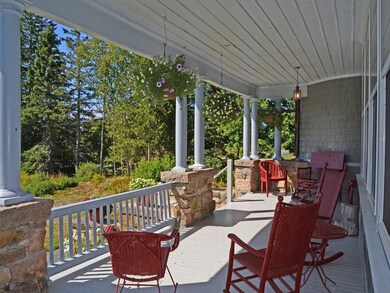 The large covered front porch is the...