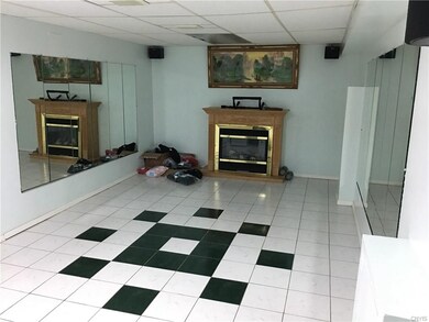 Finished, tiled basement space perfect for another