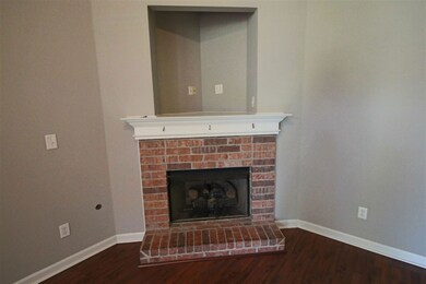Get Cozy In Front of This Gas Log Fireplace!