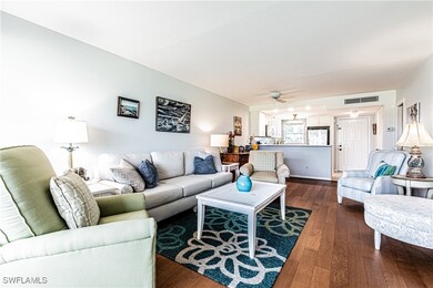 Living Room view to Kitchen and Entry
