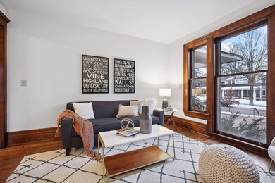 The gracious foyer with guest coat closet guides you into the handsome living room. The living room is accented with bright front windows to bathe the space in natural light.