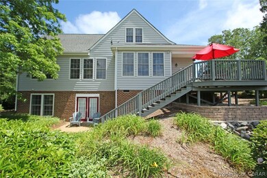 Back side of home has a nice Deck off the Kitchen