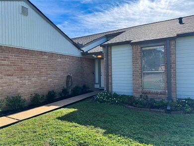 long, concrete walkway to front door