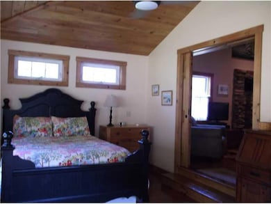 Bathroom. Bright bedroom with large...