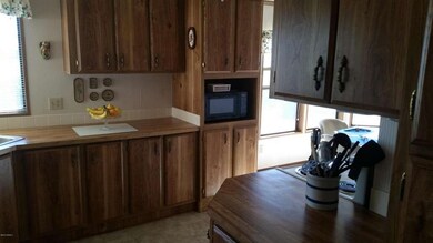 large kitchen tons of cabinets & counter