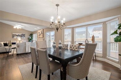 Dining room boasts bay window, professionally pain
