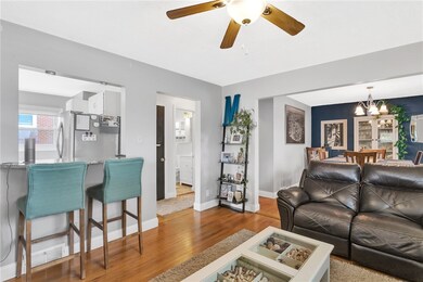 Living room that is open to the kitchen and dining
