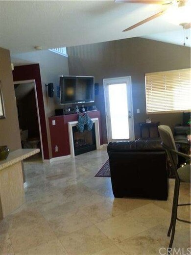 Kitchen flows into the living room. Open floor pla