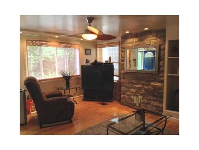 Living Room. Recessed lighting, built-ins and ston