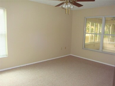 Master bedroom with view of Florida room in the ba