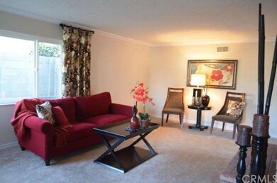 Living room is spacious and bright with original b
