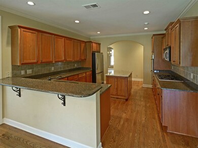 Granite counter tops,4-burner gas cooktop,double o