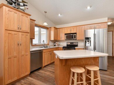 Kitchen with center island, stainless appliances a