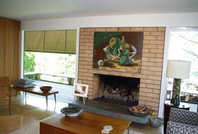 NOTE DECK OUTSIDE LIVING ROOM WINDOWS WITH CRANK D